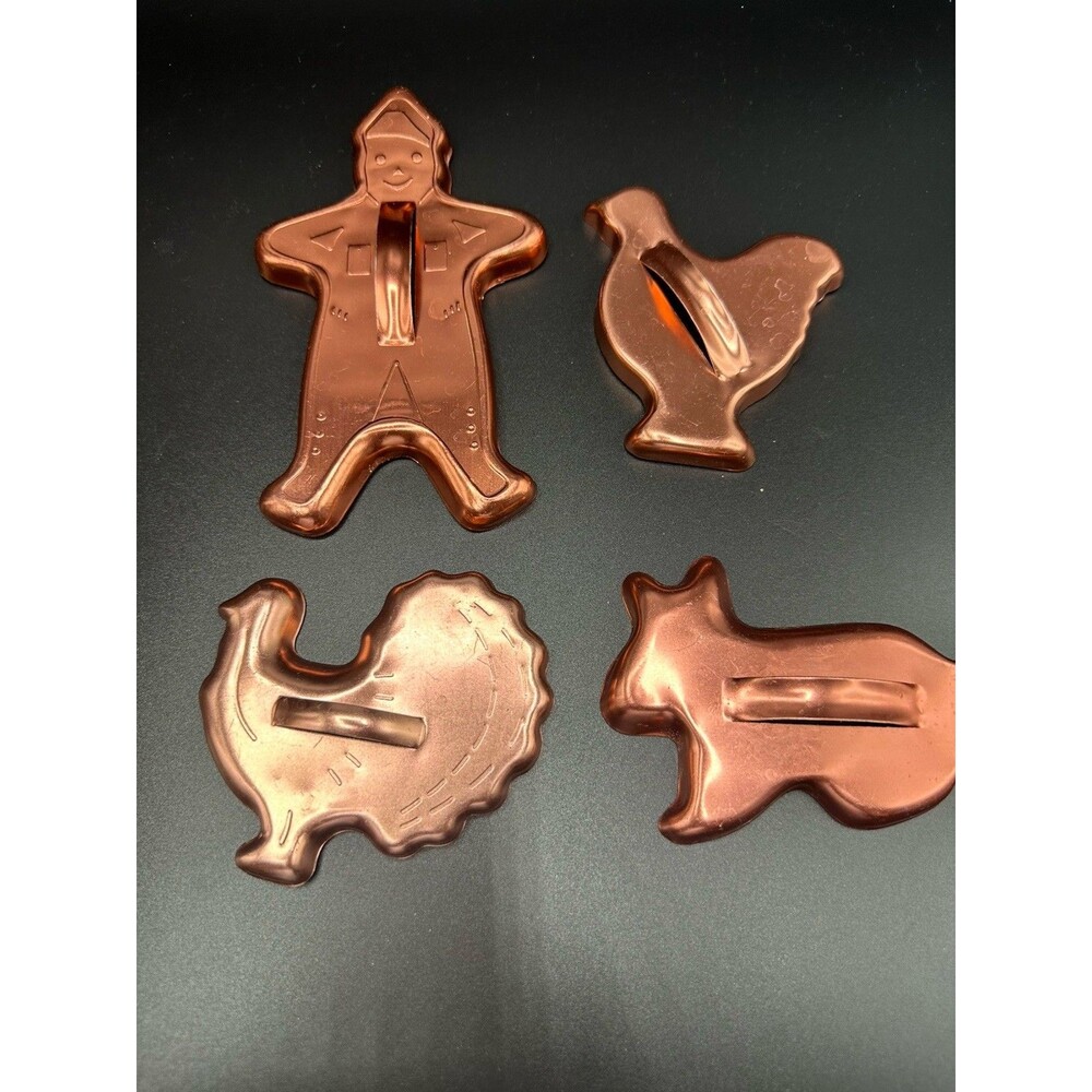 Vintage Set of 4 Aluminum Copper Tone Aluminum Holiday Cookie Cutters